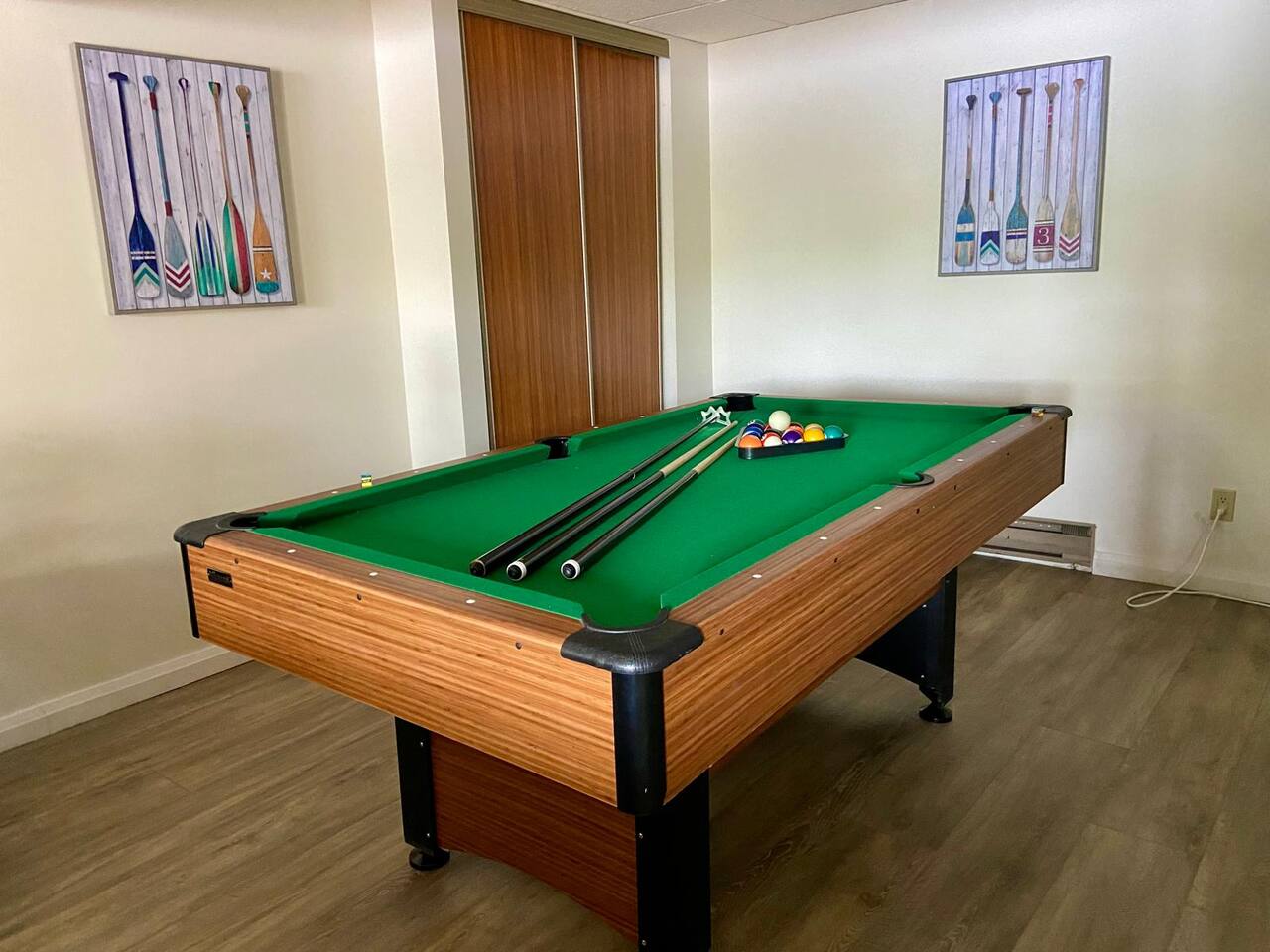 Waterfront cottage view from the lake showing dock and shoreline