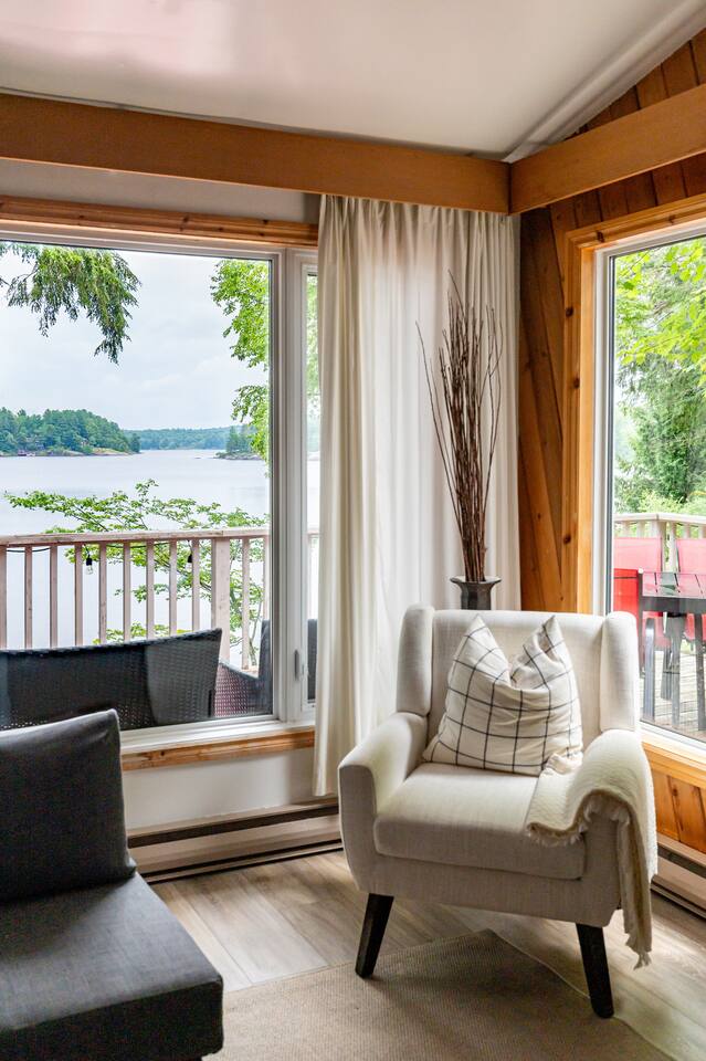 Open concept dining area with large table seating 10 guests